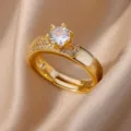 Close-up of a luxury 18K gold plated adjustable ring with a large brilliant zircon stone. - Adjustable Open / Six-Prong Solitaire With Accents (ESF384#) / Gold