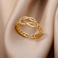 Close-up of 18K gold-plated adjustable ring with cubic zirconia leaf design - Adjustable Open / Twisted Leaf Cuban Chain (ESF388#) / Gold