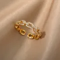 Detail view of 18K gold plated open ring with sparkling pavé set zircons on satin. - Adjustable Open / Full Rhinestone Chain Style (ESF387#) / Gold