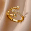 Close-up of elegant 18K gold plated open ring with pavé zircons and polished spheres - Adjustable Open / Three-Point Bead Rhinestone (ESF390#) / Gold