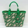 Green canvas tote bag with leather handles and stirrup charm, large capacity stylish handbag. - Chain Green