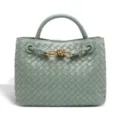 Green woven leather handbag with top handle and metal knot detail for women stylish - Reed Green
