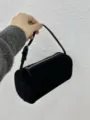 Black suede 90s cylinder shoulder bag for women, minimalist chic barrel handbag with zipper. - Full Grain Leather / Matte Black