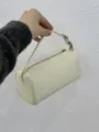 Minimalist 90s cylindrical leather shoulder bag, trendy solid color pillow handbag. - Full Grain Leather / White