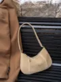 Khaki suede underarm bag, minimalist crescent shoulder bag with metallic zipper, casual. - Apple Green