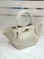 Cream white leather winged handbag detail, top handle bag with metallic lock closure. - Off White