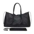 Detailed view of black woven leather tote bag with matching pouch and twin handles for daily use. - Black