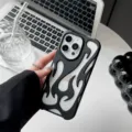 Close-up detail of matte frosted hollow flame phone case, stylish and protective cover. - iPhone16 / Hollow Flame Pattern - Matte Black