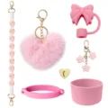 Pink tumbler accessories set with silicone boot, bow straw cover, and cute plush heart pendants. - Pink