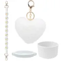 Detail view of the 4-piece white cup accessories set including daisy wristlet and pom-pom. - White