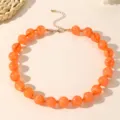 Chic collana statement con perline in acrilico arancione stile bohémien da donna. - Arancione