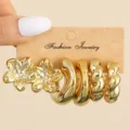 Goldene Statement Blumen Creolen Set, klobige verdrehte Metall Ohrringe für Damen Mode. - Geometrische Blume (Modell B)