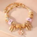 Vergoldeter Charm-Armband mit rosa Kristallperlen und Herzanhängern für Damen modischer Schmuck - Rosa Kräuselperle Feder Stil (BZ2413jinseHB)