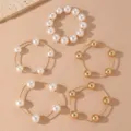 Set di bracciali multistrato con perle bianche e sfere dorate gioielli donna. - Stile 1