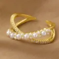Verstellbarer goldener offener Ring mit Perlen und Zirkonia elegante Damen Schmuckmode - Gekreuzter Perlen-Strass-Stil (RZ0910jiaocha)