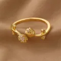 Vergoldeter offener Ring mit zartem Tulpenblüten-Design und funkelnden Zirkoniasteinen. - Tulpenblüten-Stil (RZ0911huaduo)