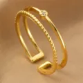 Doppelter offener Ring mit kleinen Zirkonia, eleganter goldfarbener verstellbarer Fingerschmuck. - Doppelschichtiges Design (RZ0911shuangceng) / Gold