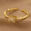 Vergoldeter verstellbarer offener Ring mit rechteckigem Zirkon und funkelnden Schmucksteinen. - Quadratischer Stil (RZ0911fangkuai) / Gold