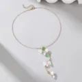 Elegante collana a Y con perle di mughetto, delicata catena dorata, affascinanti dettagli floreali. - Stile Oro (NZ2970)