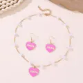 Charming pink heart enamel pendant necklace and earrings set with delicate pearl chain details. - Pearl Heart Style
