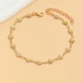 Gold tone metal anklet featuring enamel daisy charms with white petals and yellow centers. - White Daisy Style / Gold-White Daisy