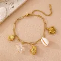 Goldenes Ozean-Anhänger-Armband mit Schildkröte, Seestern und Muscheln für Strandurlaub. - Einzeln Meeresschildkröte / Gold