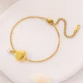 Goldfarbenes Muschel Perlen Armband Detailansicht eleganter Strandstil Modeschmuck - Einzeln Muschel Perle / Gold