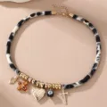 Leopardenmuster Kordel Halskette mit Goldperlen und Anhängern schick Choker Damen Schmuck - Leopard Herz Stil