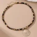 Modische Leopard Print Samtseil Halskette mit goldenem Muschel Anhänger elegante Damenschmuck - Muschelanhänger Stil