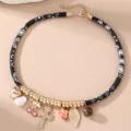Damen Mode Choker Halskette schwarz gemusterte Kordel mit Charms Kreuz Perle Schmuck SKU - Schwarz Weiß Paisley Kreuz Stil