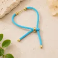 Turquoise geweven koord armband verstelbare schuifm kralen gouden metalen accenten DIY - Lichtblauw