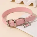 Pink leather choker necklace with cute bone pendant and metal hardware for edgy fashion styles. - Pink (NZ3217fense)