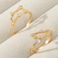 Detailaufnahme goldener Sternbildringe mit funkelndem Zirkonia und glänzendem Finish. - Vergoldeter Typ - Steinbock (RZ0816)