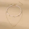 Doppelreihiges Perlen Halsketten Set mit Schmetterling und Leo Buchstaben Anhänger für Damen. - Löwe Sternzeichen (NZ2887) / Gold