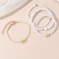Mehrlagiges Sternbild Perlen Armband Set mit eleganten Perlen und wunderschönem Tierkreiszeichen. - Krebs / 4-teiliges Set