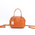 Orange vegetable tanned leather retro shoulder crossbody pillow bag variant style. - Orange