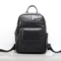 Premium black leather laptop backpack for men, multi-compartment business casual school bag. - Black