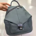 Grey leather backpack for women, casual daypack with front pocket and metal closure. - Blue