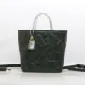 Borsa a mano in vera pelle verde scuro, borsa a tracolla in pelle conciata al vegetale. - Verde