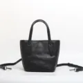 Classica borsa a secchiello in vera pelle nera, borsa a tracolla versatile per donna elegante. - Nero