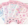 Set of five sheets featuring colorful 3D crystal gem and flower rhinestone stickers - 1 Piece / Random plum blossom