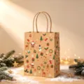 Full view of the festive Christmas kraft paper gift bag showing vibrant Santa patterns - Christmas Elements / 15*8*21cm