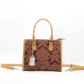 Borsa a mano vintage in vera pelle da donna, borsa tracolla in pelle bovina goffrata. - Marrone giallastro