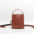 Vintage embossed genuine cowhide bucket bag with detachable shoulder strap and top handle. - Light Brown - 2
