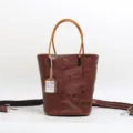 Vintage brown embossed leather bucket bag with top handles and detachable shoulder strap. - Red Brown
