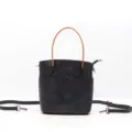 Borsa a secchiello in pelle nera con manico marrone e tracolle rimovibili per le donne - Nero