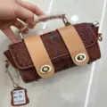 Borsa a mano cilindrica in vera pelle vintage, borsa a tracolla goffrata retro. - Borgogna