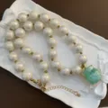Collana di perle acriliche iridescenti con ciondolo verde elegante gioiello da donna alla moda - Stile Ciondolo Animale Verde (07-M26)