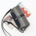 Stylish cylindrical men's shoulder bag with chic colorblock design and adjustable strap. - Gray/Black