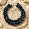 Elegante collana girocollo con perle in resina a doppio strato, accessorio da spiaggia. - Blu Scuro